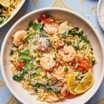 Bowl of orzo and shrimp with lemon and spinach