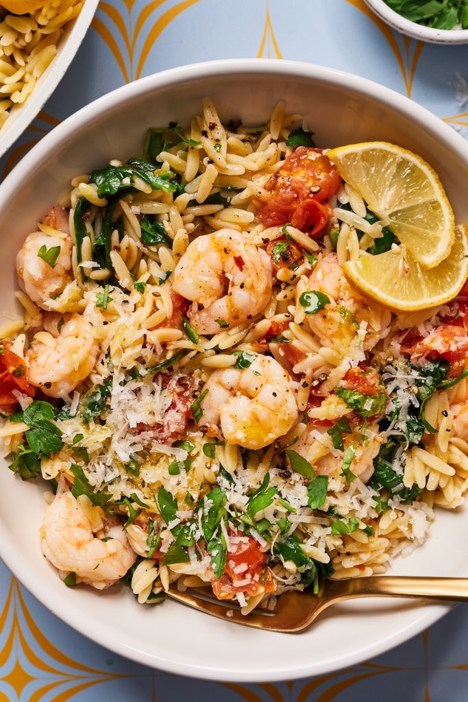 Bowl of garlic butter shrimp and orzo