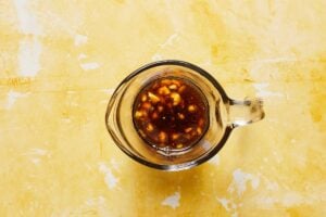 dressing for mandarin orange salad in a mixing cup