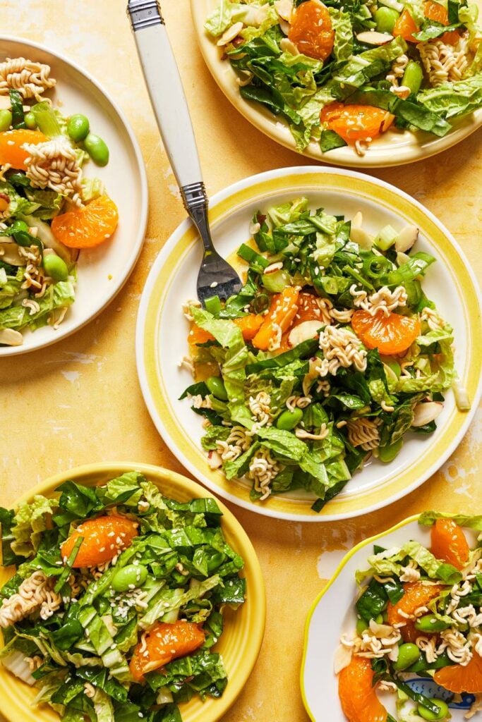 plates of mandarin orange salad with forks