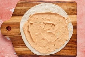 tortilla with taco cottage cheese spread on top