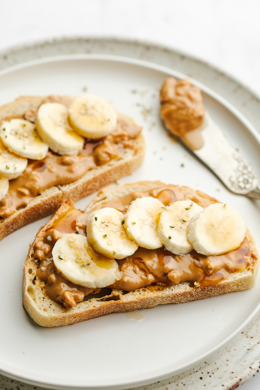 Spreading Peanut Butter On Bread